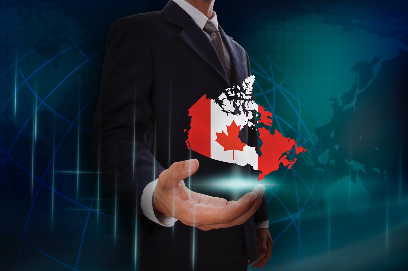 Businessman holding digital map of Canada