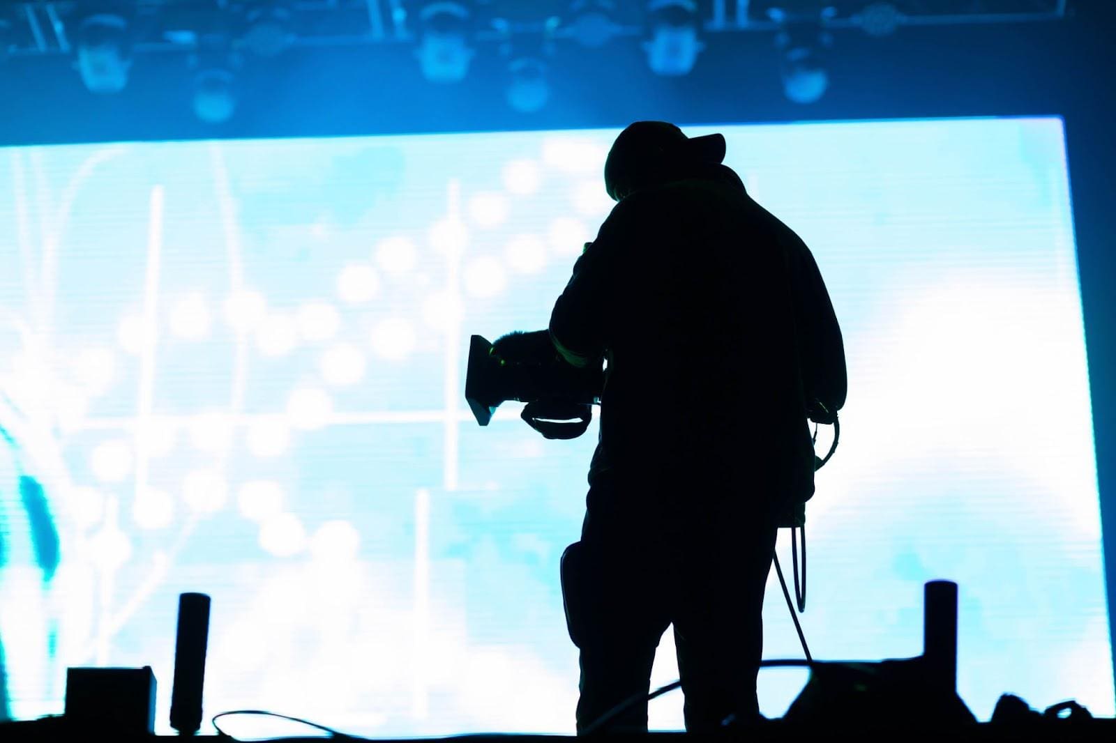 Camera operator films television episode in Canada.